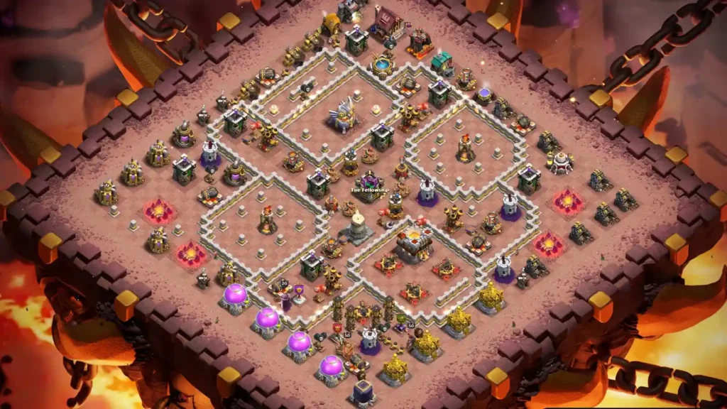 TH11 war base layout with Town Hall centered inside triple compartments and Clan Castle, Eagle Artillery mid-base