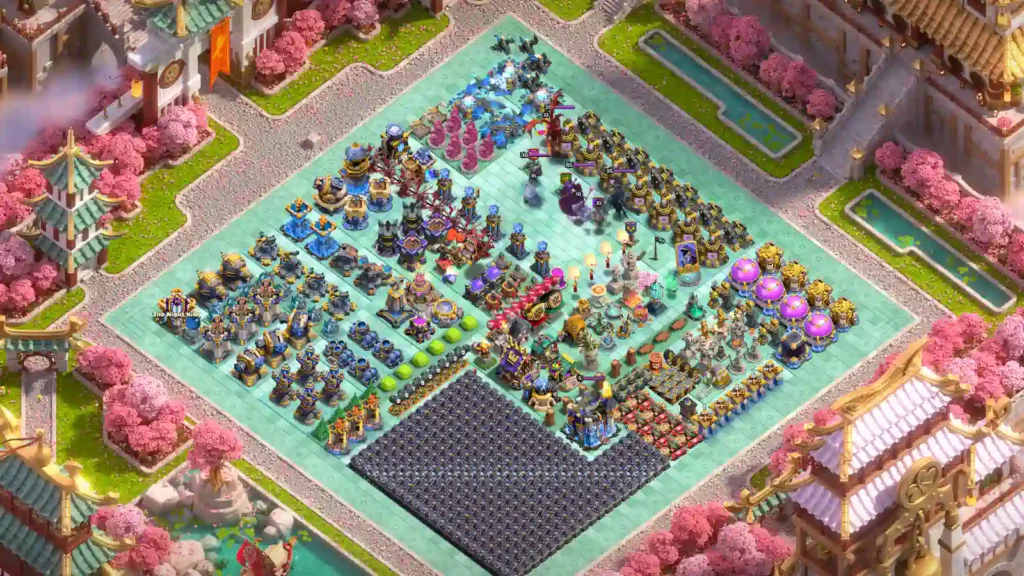 TH18 progress base with an organised wall collection and grouped buildings