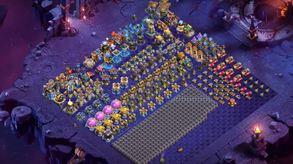 TH18 progress base with a dense wall stockpile display and grouped building rows